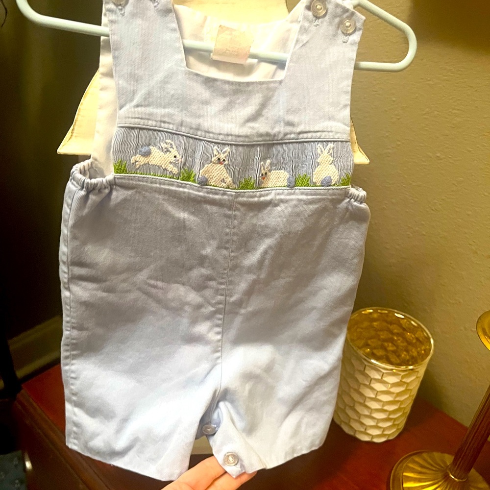 Baby boy smocked romper with beautiful embroidered bunnies. Perfect for Easter
